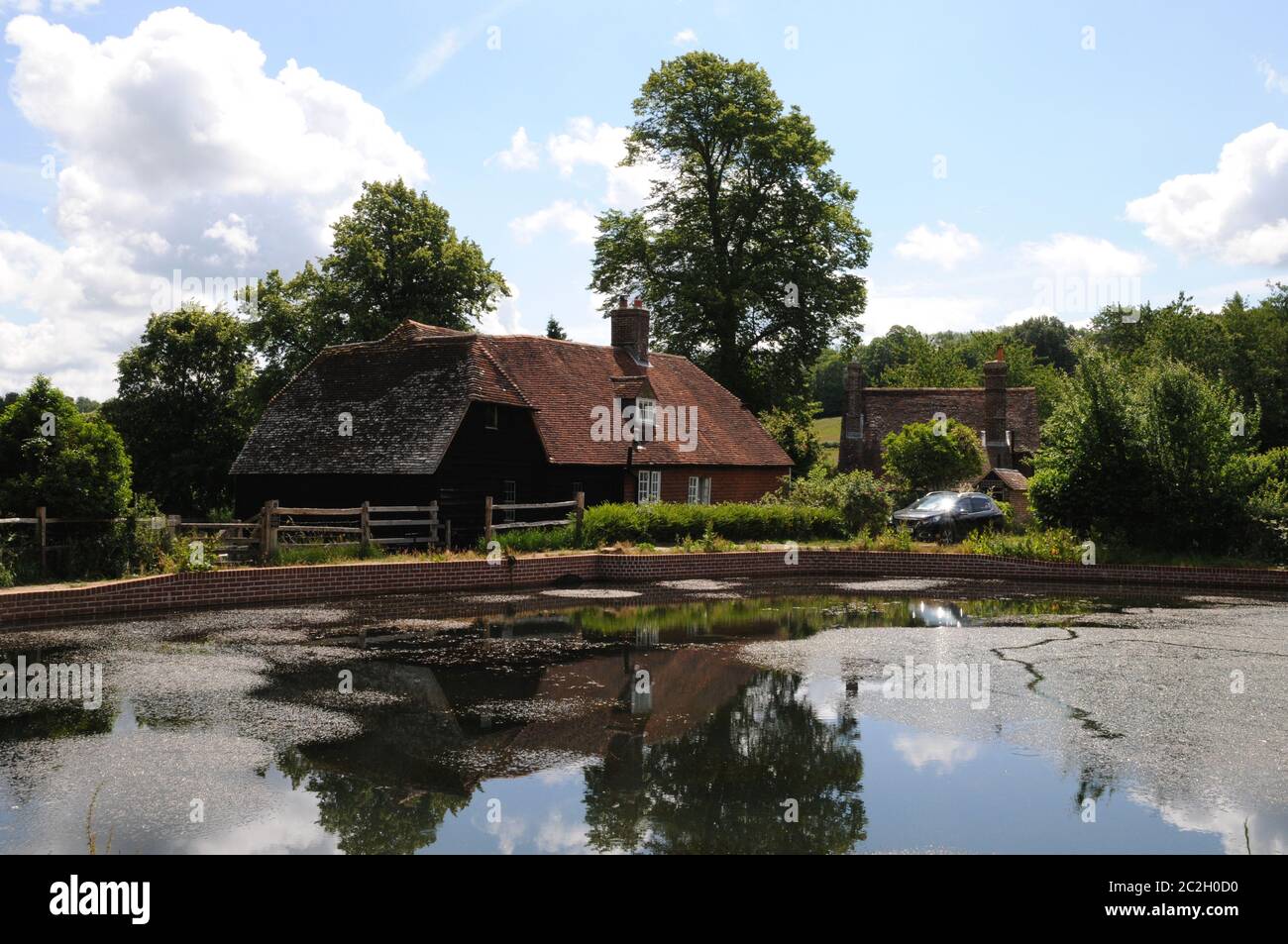 Park Mill at Bateman's, Rudyard Kipling's home from 1902 - 1936. The mill and its pond (seen here) have recently undergone extensive renovations. Stock Photo