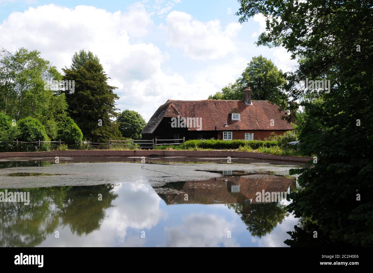 Park Mill at Bateman's, Rudyard Kipling's home from 1902 - 1936. The mill and its pond (seen here) have recently undergone extensive renovations. Stock Photo