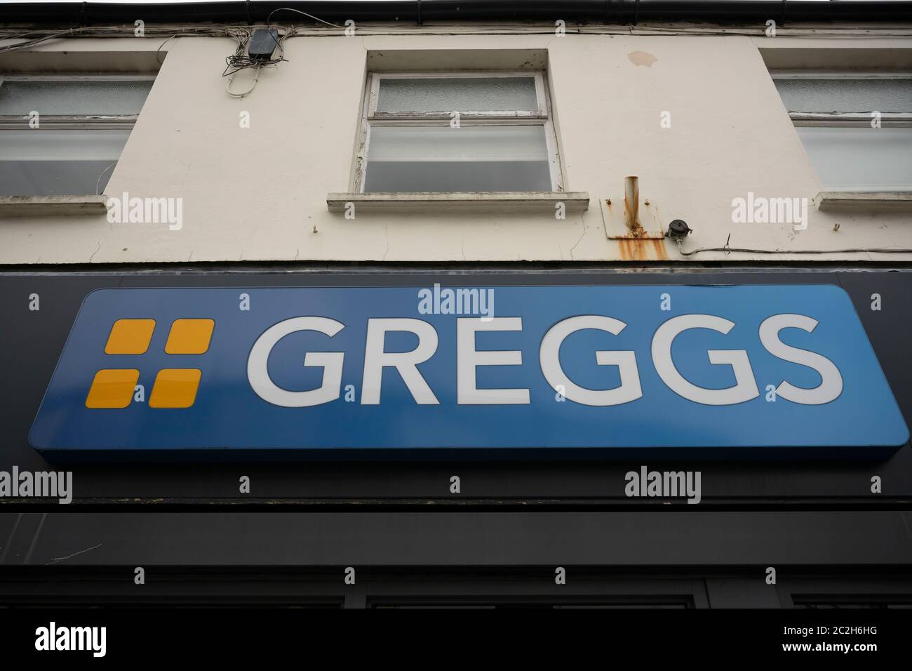 A close-up of a Greggs bakery sign Stock Photo - Alamy