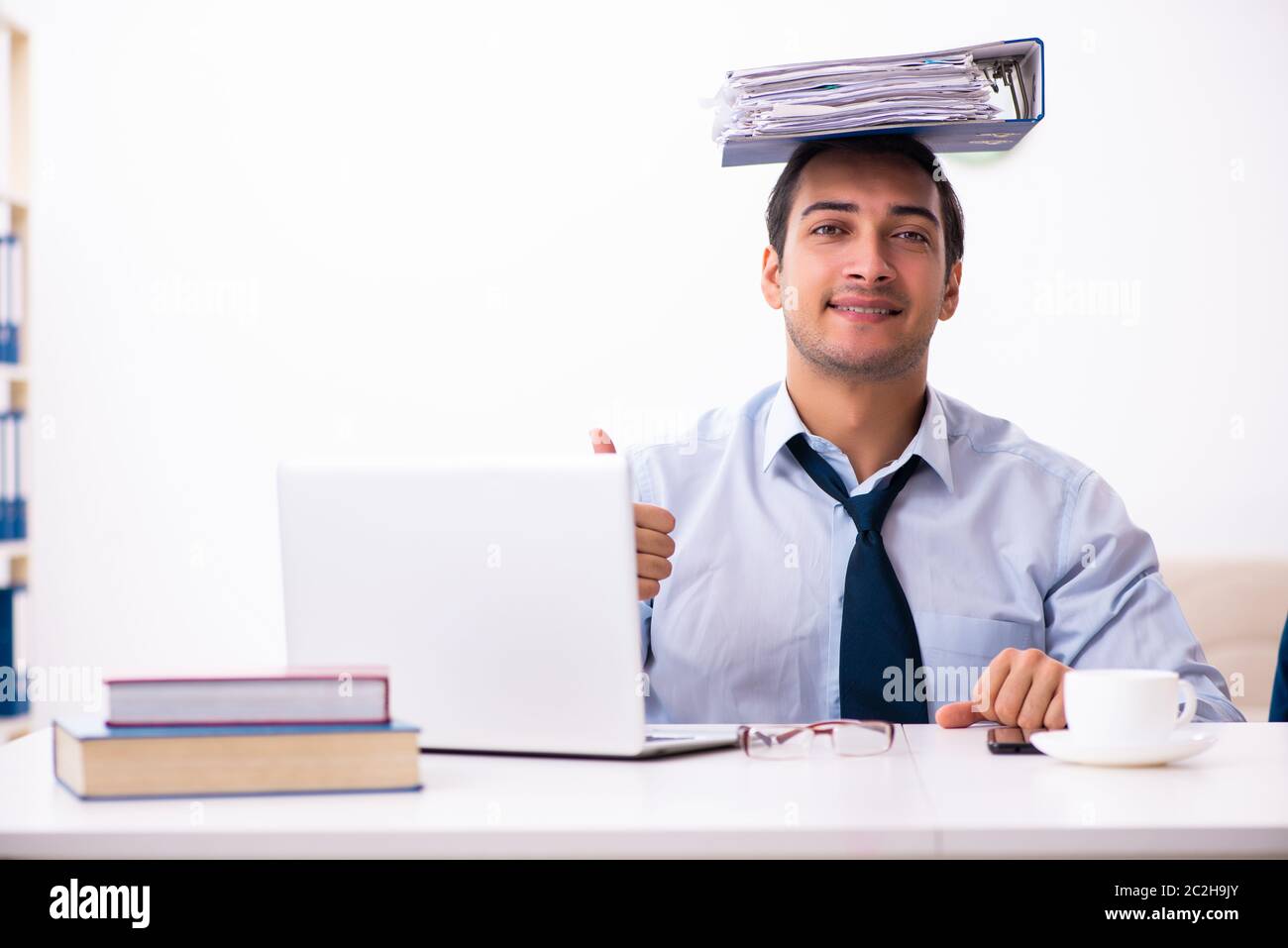 Employee giving folder happy hi-res stock photography and images - Alamy