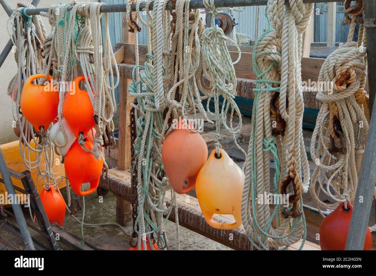 collection of bouys and ropes from the marine industry Stock Photo Alamy