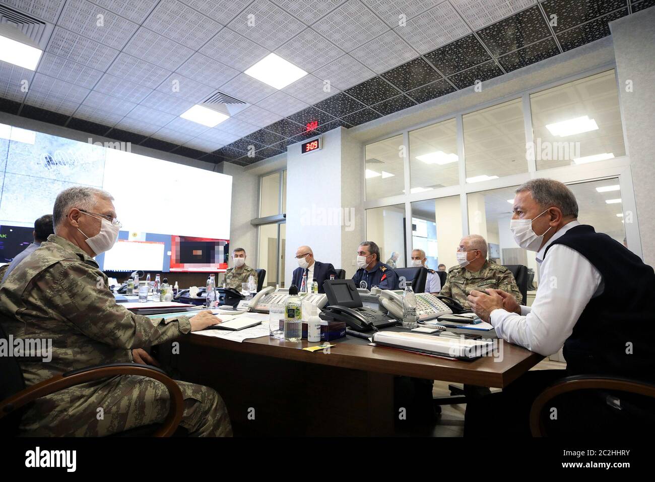 Ankara. 17th June, 2020. Turkish Defense Minister Hulusi Akar (1st R) attends a meeting with other commanders at the Army Command Control Center in Ankara, Turkey, on June 17, 2020. Turkey has launched Operation Claw-Tiger in northern Iraq with its commando forces supported by air elements, Turkish Defense Ministry announced on Wednesday. Credit: Xinhua/Alamy Live News Stock Photo