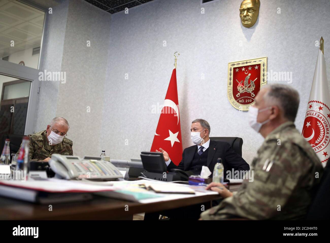 Ankara. 17th June, 2020. Turkish Defense Minister Hulusi Akar (C) attends a meeting with other commanders at the Army Command Control Center in Ankara, Turkey, on June 17, 2020. Turkey has launched Operation Claw-Tiger in northern Iraq with its commando forces supported by air elements, Turkish Defense Ministry announced on Wednesday. Credit: Xinhua/Alamy Live News Stock Photo