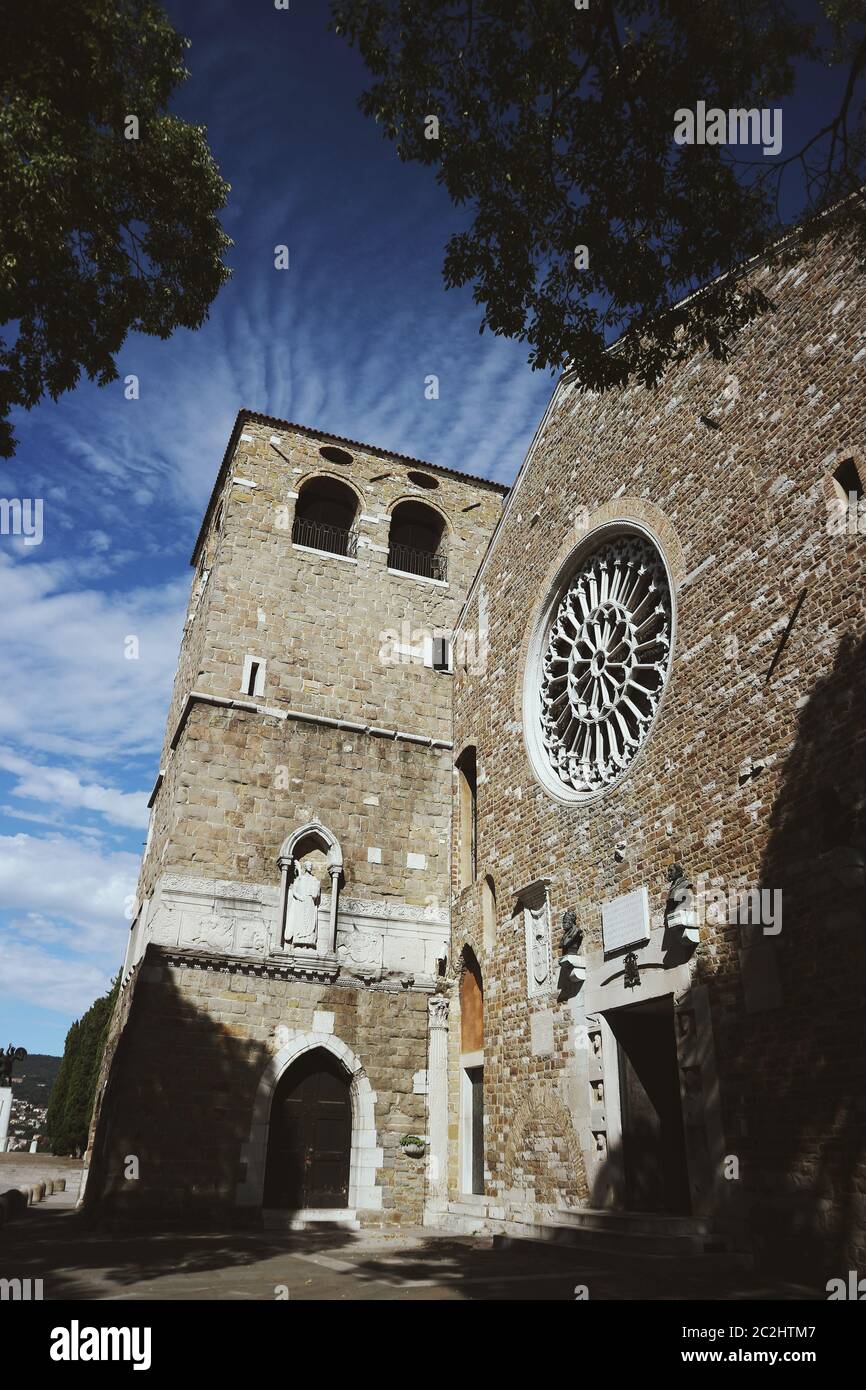 Cattedrale di San Giusto Martire on a sunny day in Trieste, Italy. Stock Photo