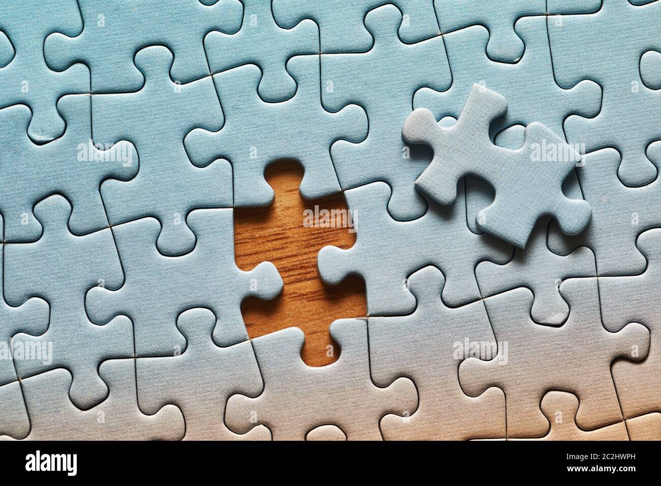 Jigsaw puzzle background, one last piece missing only, easy task Stock  Photo - Alamy