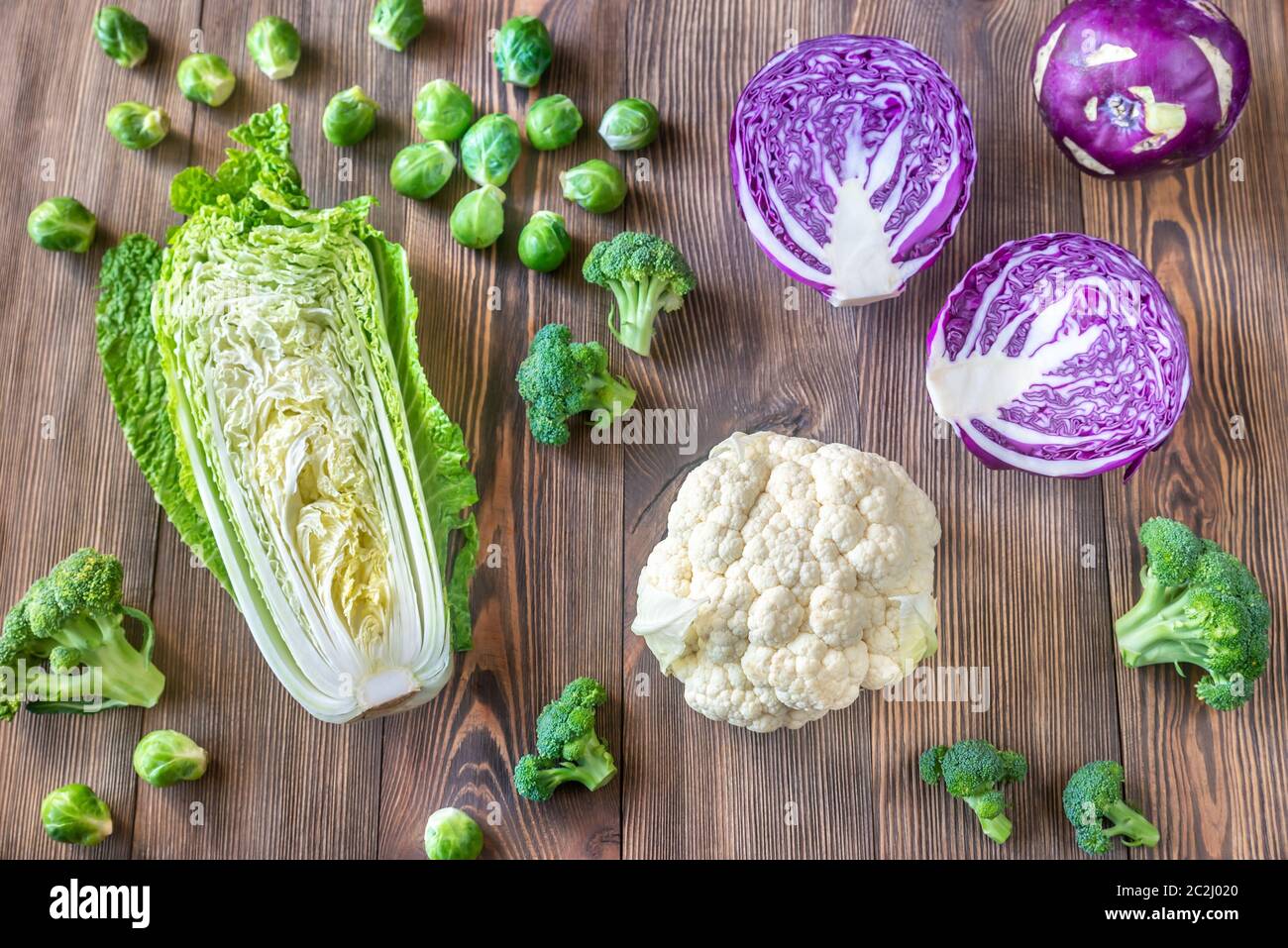 Assortment of different Cruciferous vegetables on the wooden background Stock Photo