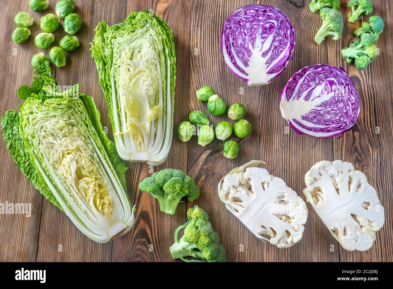 Assortment of different Cruciferous vegetables on the wooden background Stock Photo