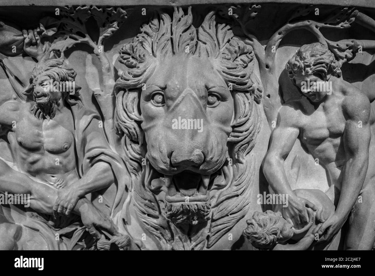 Moscow, Russia - November 9, 2017: Pushkin Museum of Fine Arts. Ancient lion head relief on the wall. Mythology stone art bas-re Stock Photo