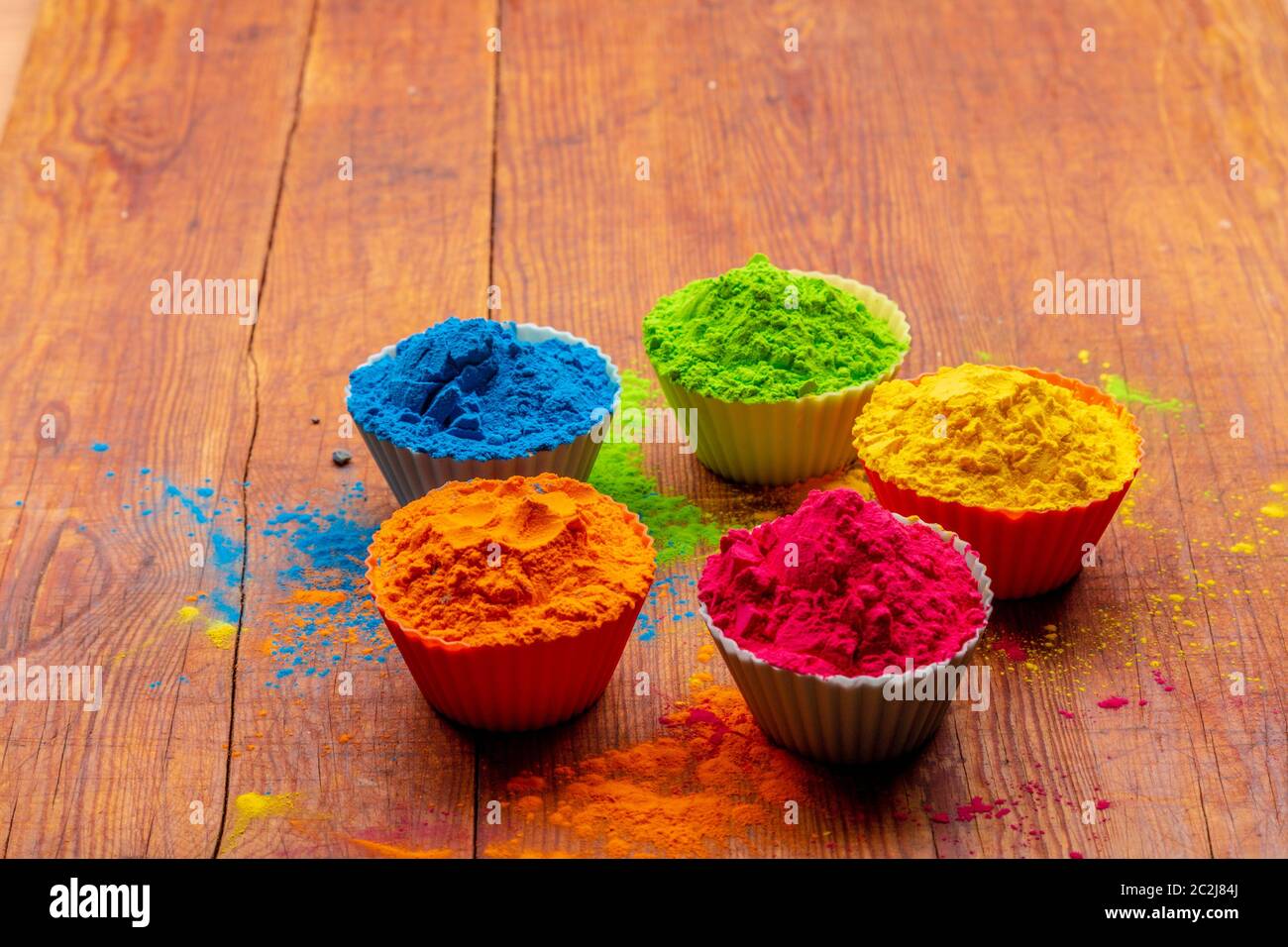 Holi color powder. Organic Gulal colours in bowl for Holi festival