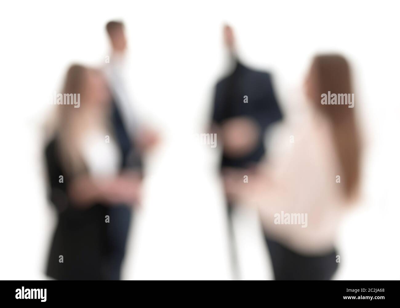 blurry image of employees standing in the office. Stock Photo