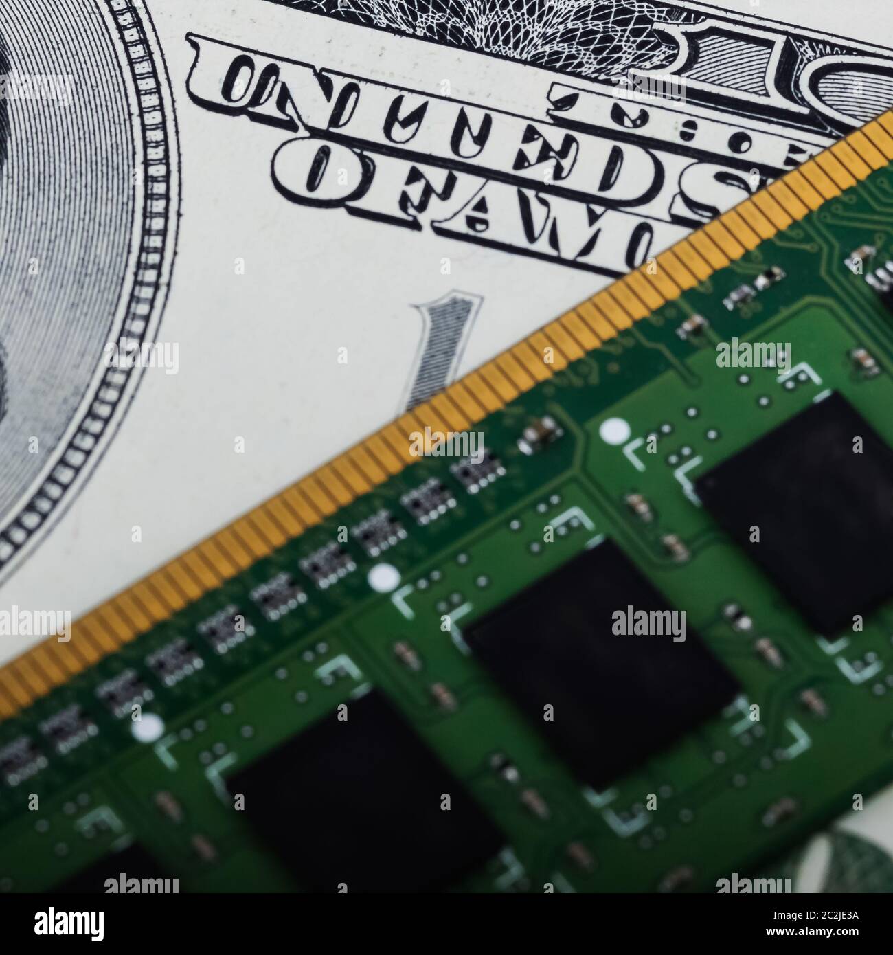 Computer board and one hundred dollars bill closeup Stock Photo Alamy