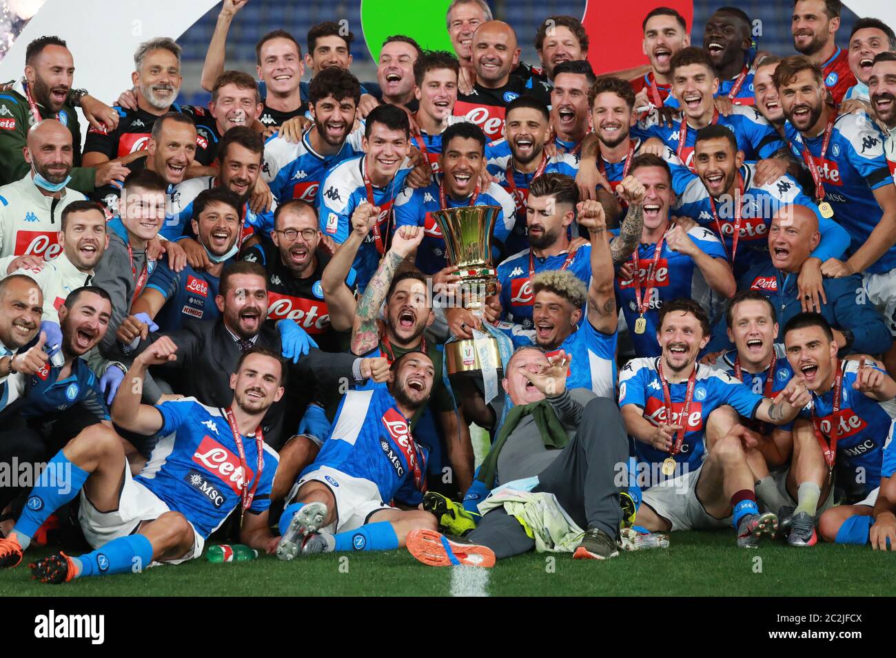 Stadio Olimpico, Rome, Italy. 17th June, 2020. Coppa Italia Final, Napoli versus Juventus; Napoli players and manager celebrate their penalty shoot-out win after the game with the winners trophy Credit: Action Plus Sports/Alamy Live News Stock Photo