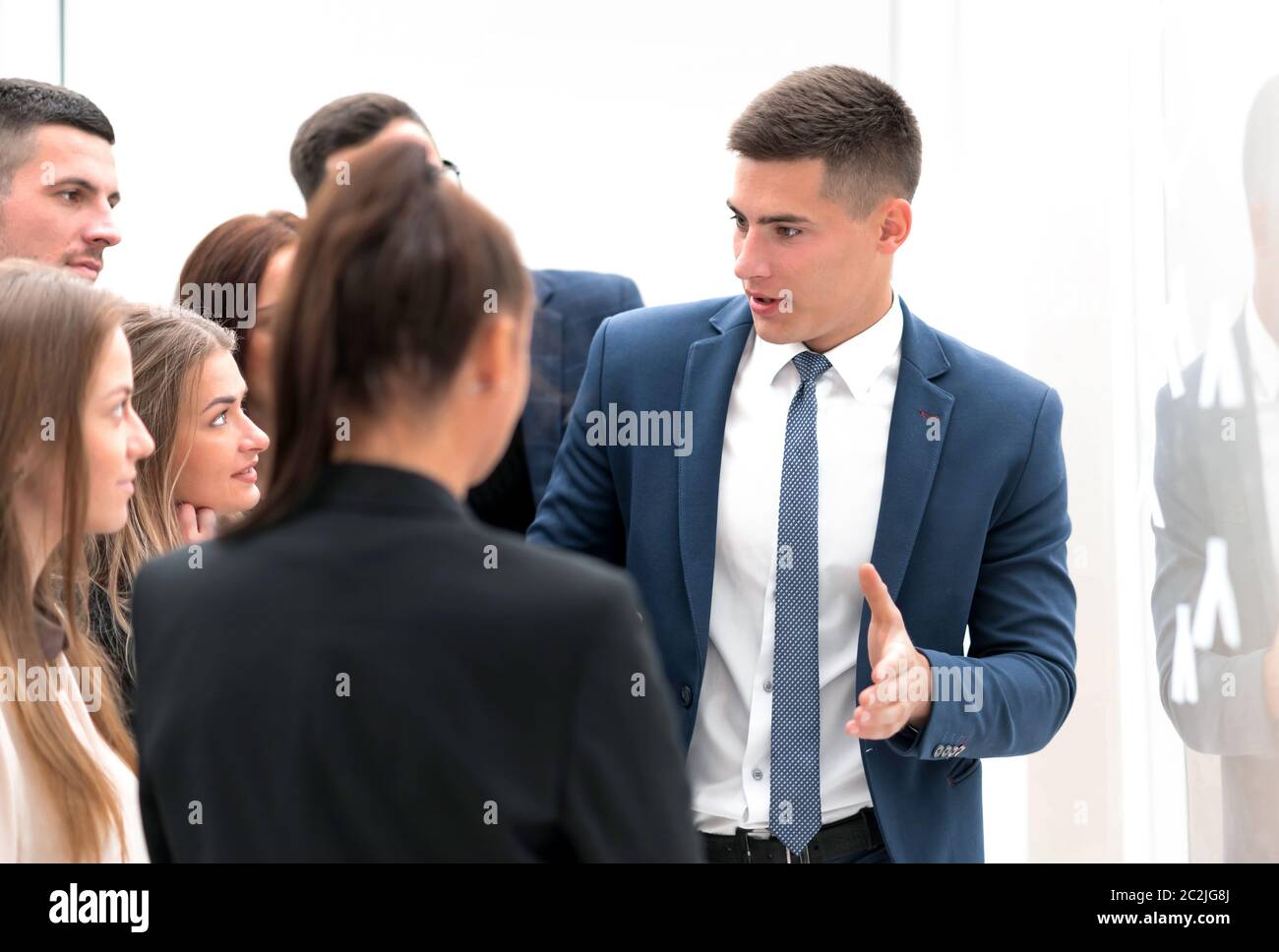 Office workers employees stand hi-res stock photography and images - Alamy