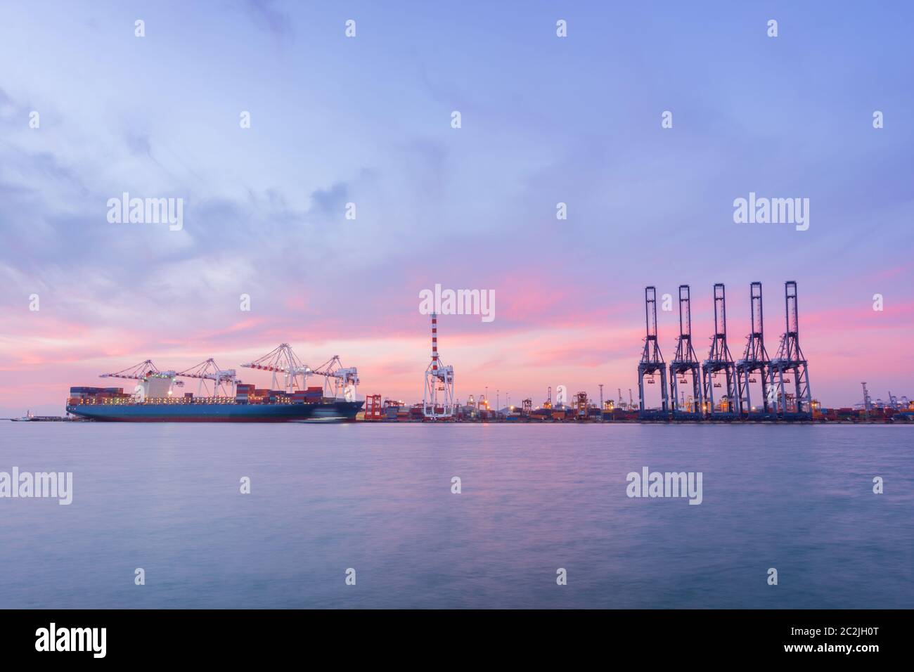Containers loading by crane in the sunset, Trade Port , Shipping ...