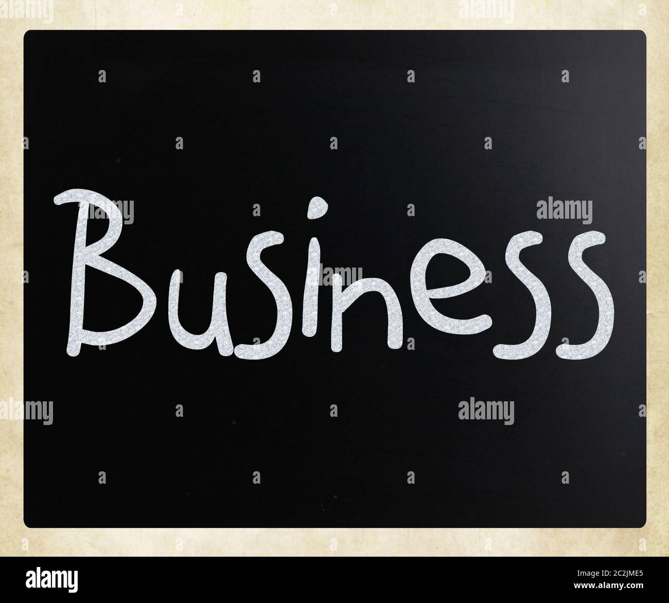The word "Business" handwritten with white chalk on a blackboard Stock ...