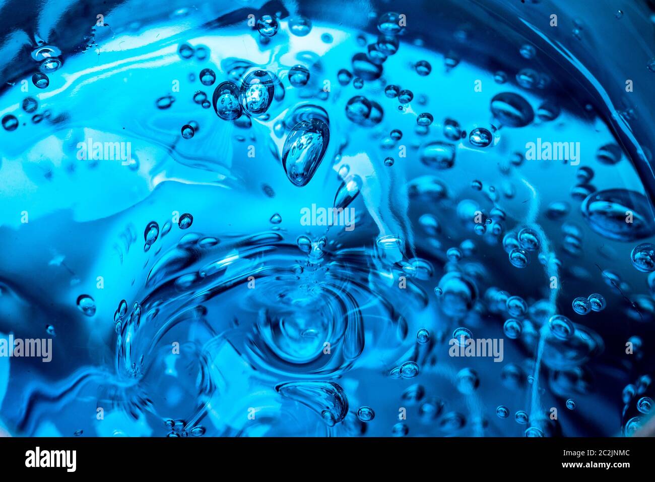 Water blue gel balls. Polymer gel. Silica gel. Balls of blue hydrogel. Crystal liquid ball with reflection. Texture background. Stock Photo