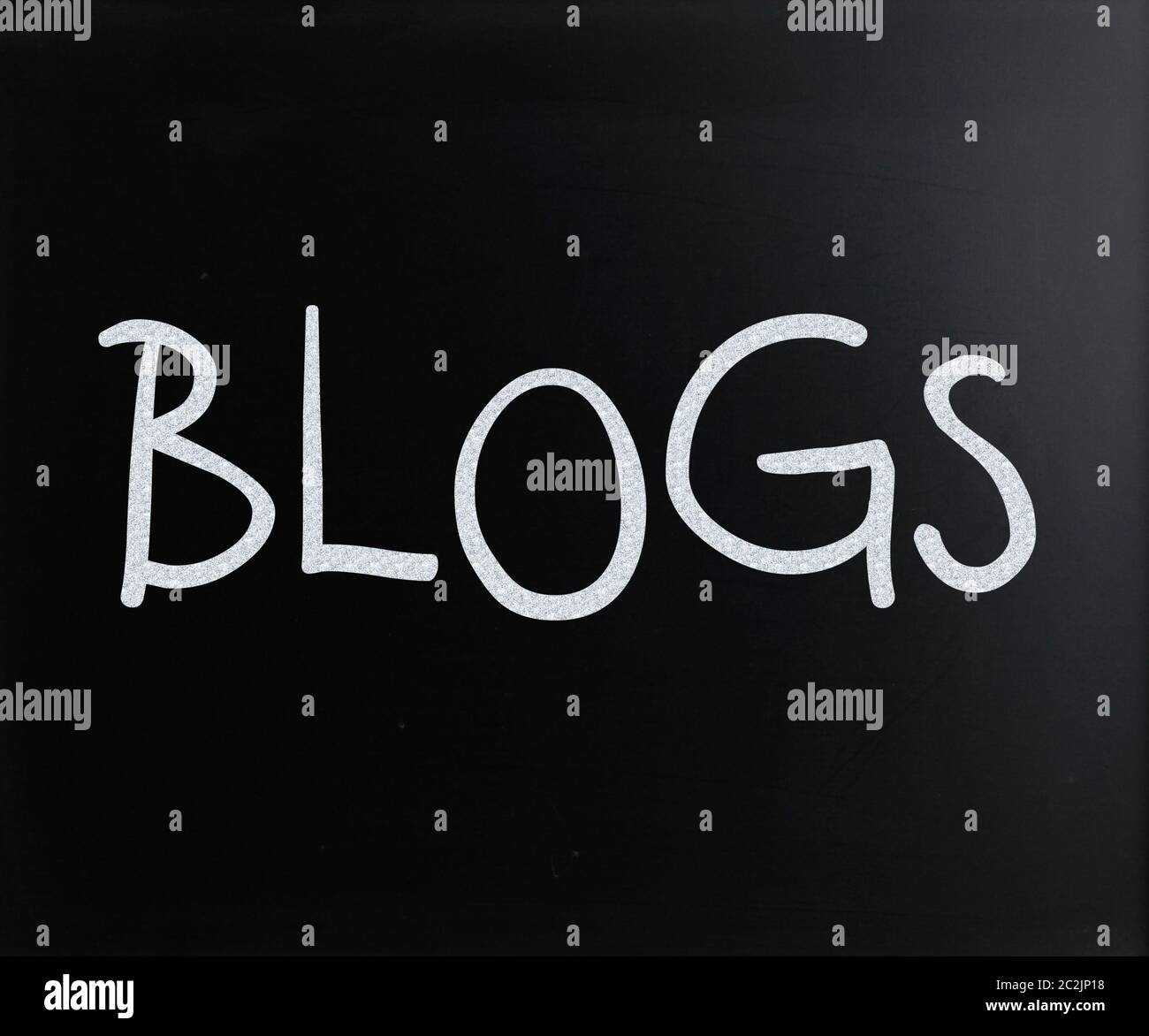 "Blogs" handwritten with white chalk on a blackboard Stock Photo Alamy