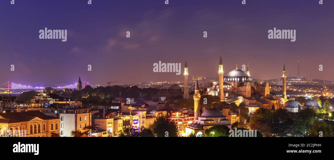 Hagia Sophia and the Bosphorus Bridge, evening panorama of Istanbul. Stock Photo