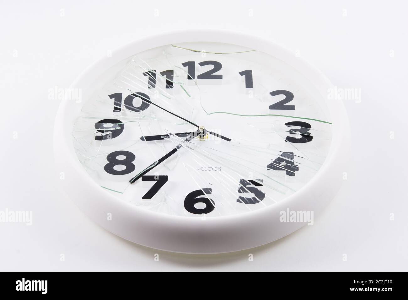 White clock is broken glass isolated on white background Stock Photo