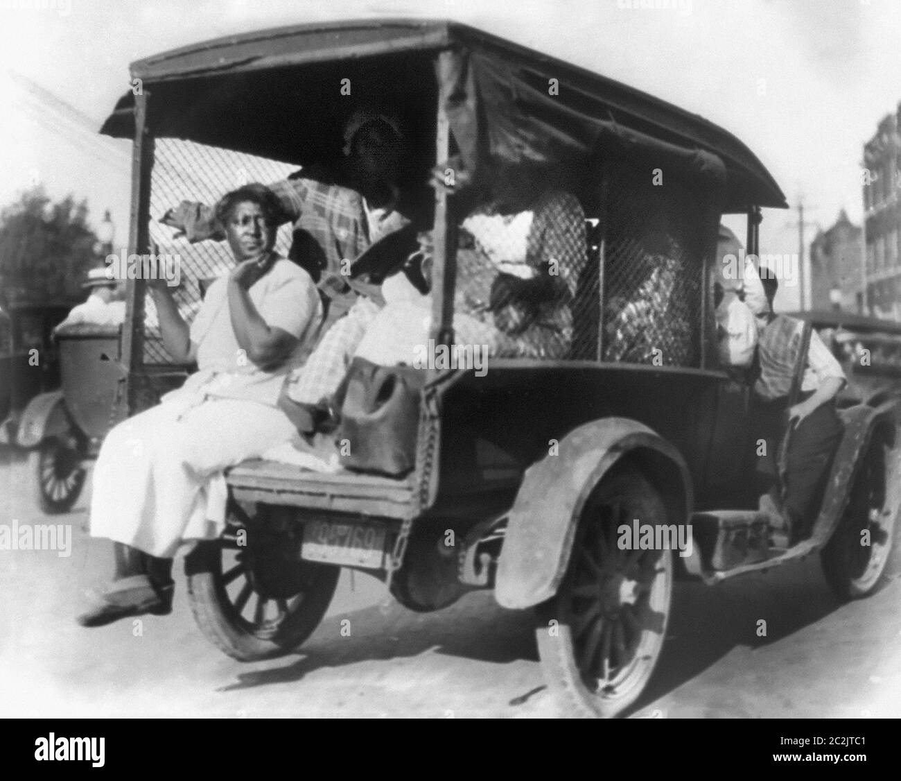 Rear View of Truck carrying African Americans during Riot, Tulsa, Oklahoma, USA, Alvin C. Krupnick Co., 1921 Stock Photo