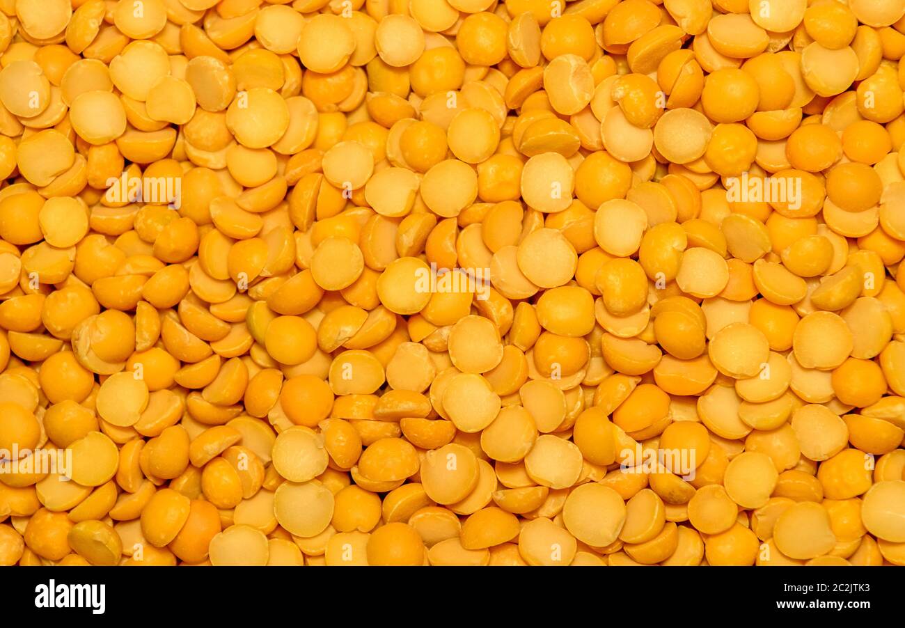 Close up heap of mung bean or Mung dahl dried food ingredient, also known as green gram, maash, moong species of legume family. Food for healthy eatin Stock Photo