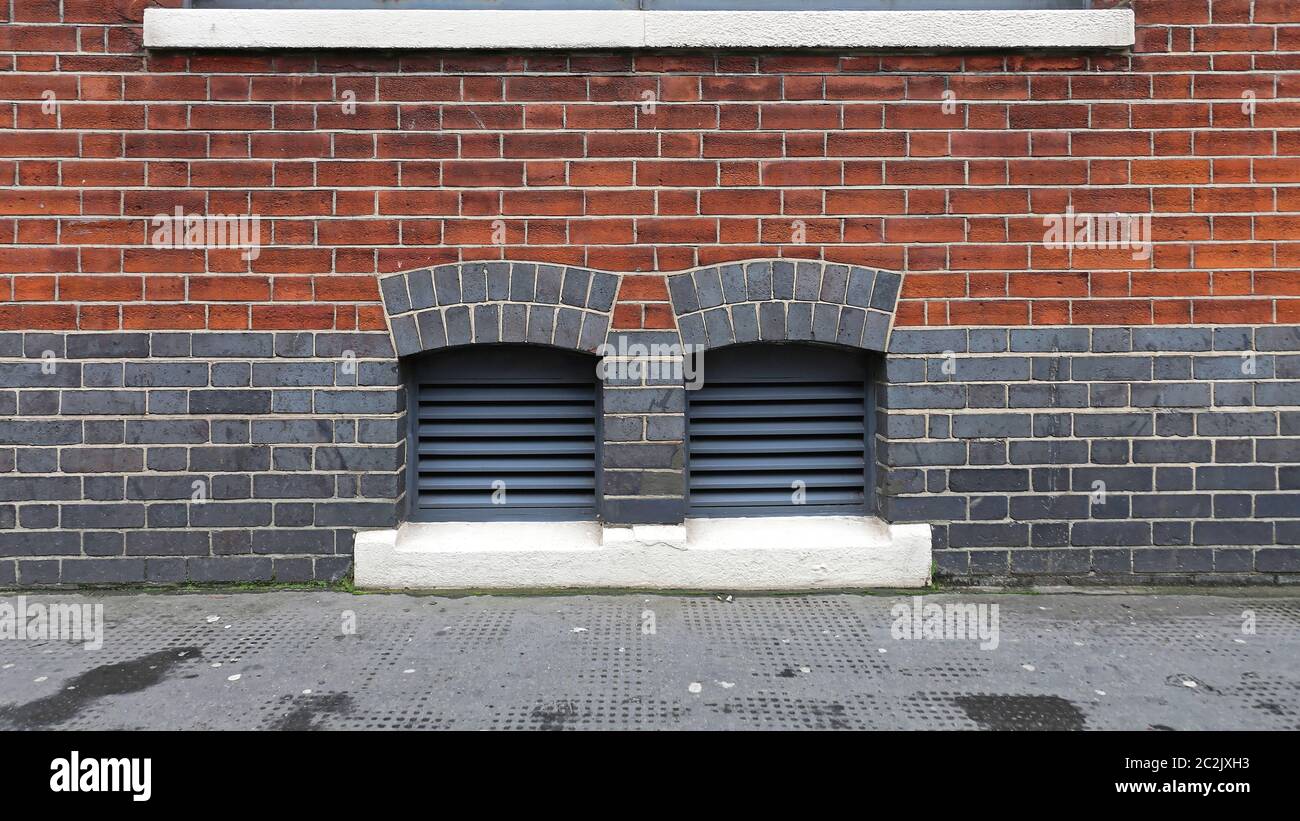 Two Ventilation Inlets Grille at Brick Building Exterior Stock Photo ...