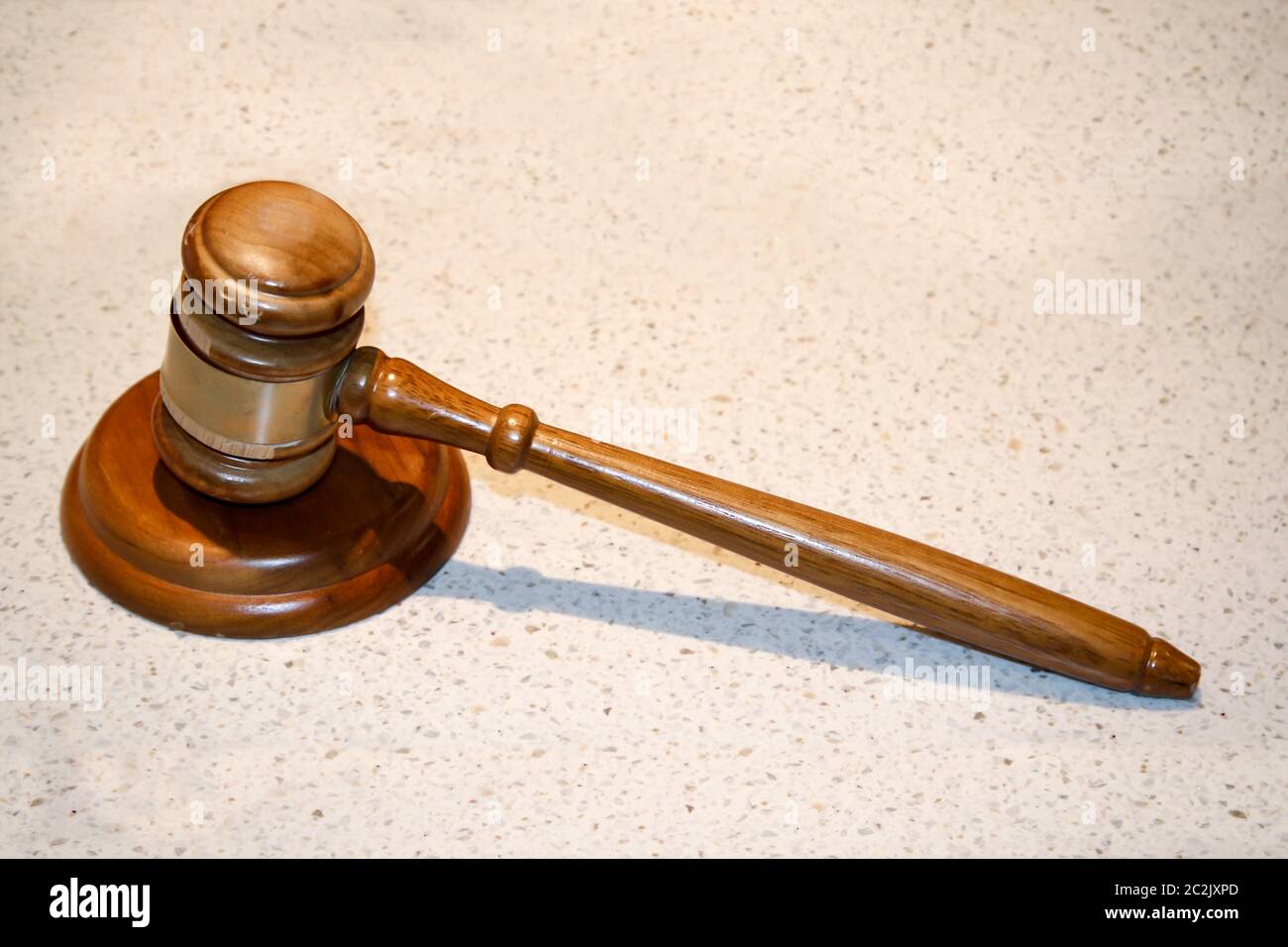 a judge's hammer, or even a hammer for knocking down an auction Stock Photo
