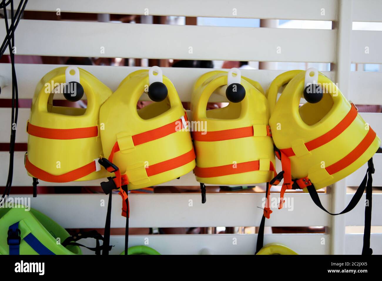yellow buoyancy aid, lifejackets for children with signal colors Stock Photo