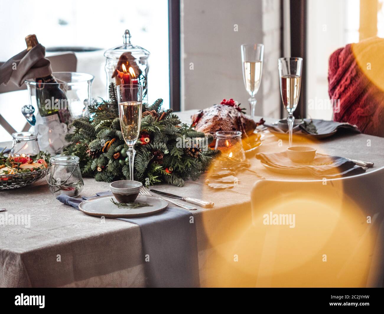 Table setting for Christmas dinner, image with bokeh Stock Photo