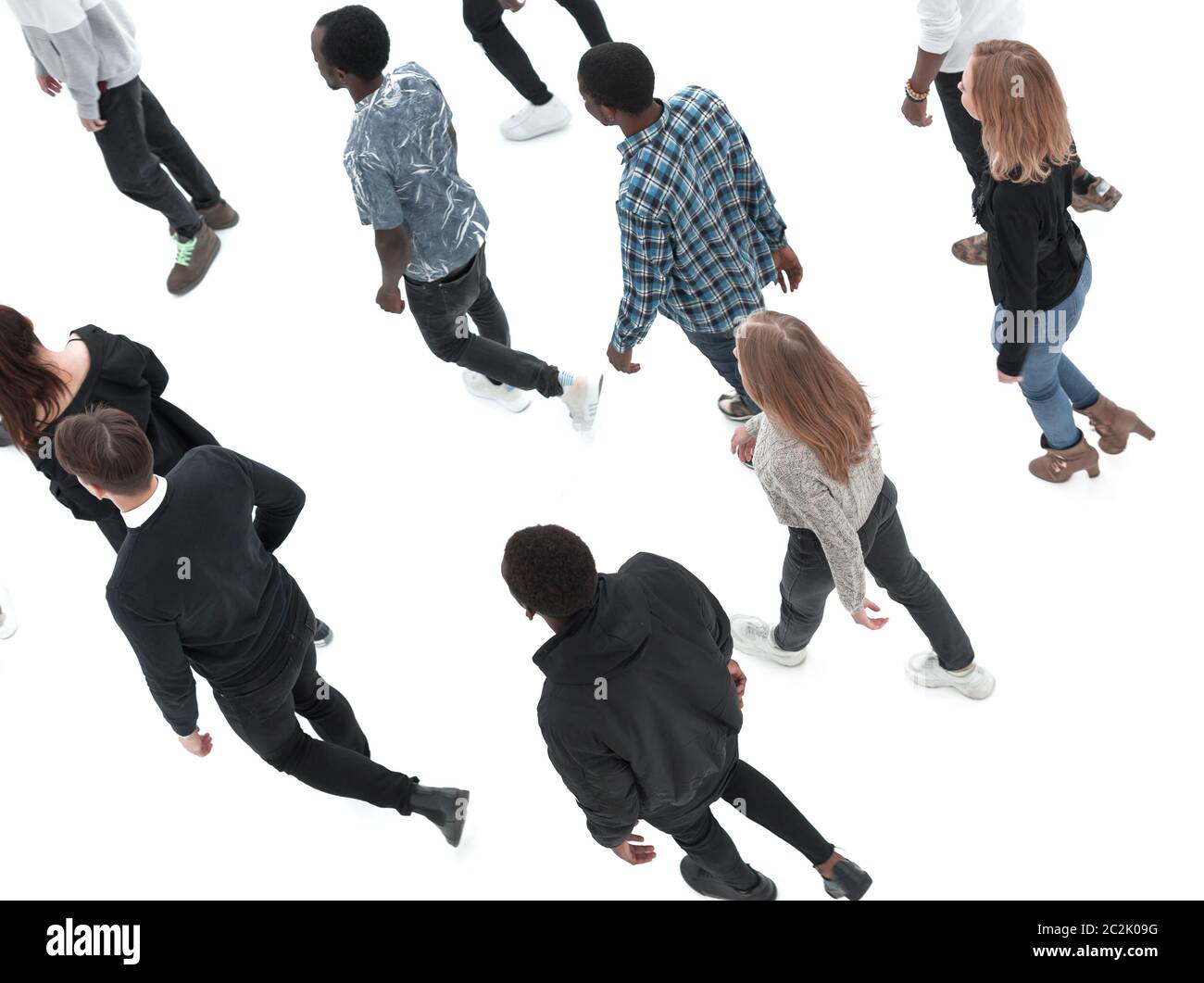 group of diverse young people walking in the same direction Stock Photo
