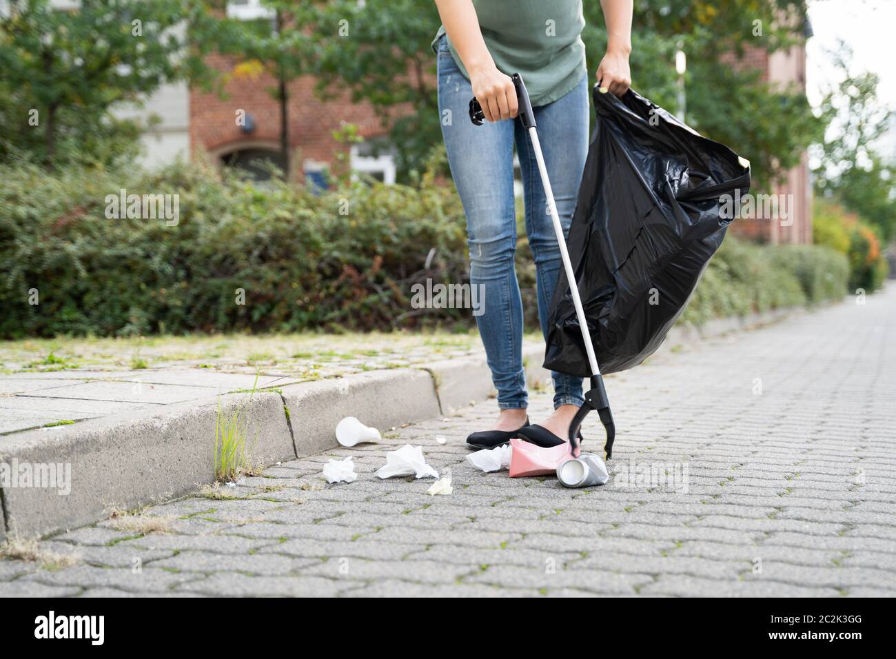 Litter picker grabber hires stock photography and images Alamy