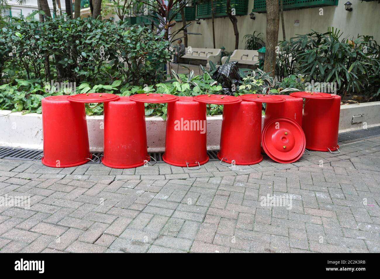 Many Red Plastic Buckets Bins Up Side Down Stock Photo Alamy