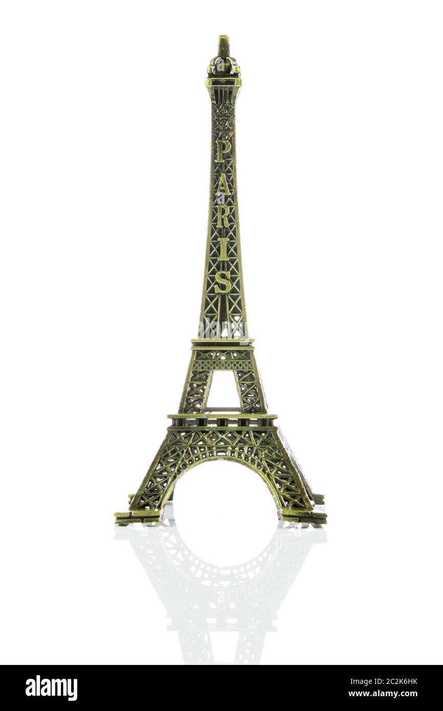 Small Eiffel tower isolated on over white background Stock Photo - Alamy