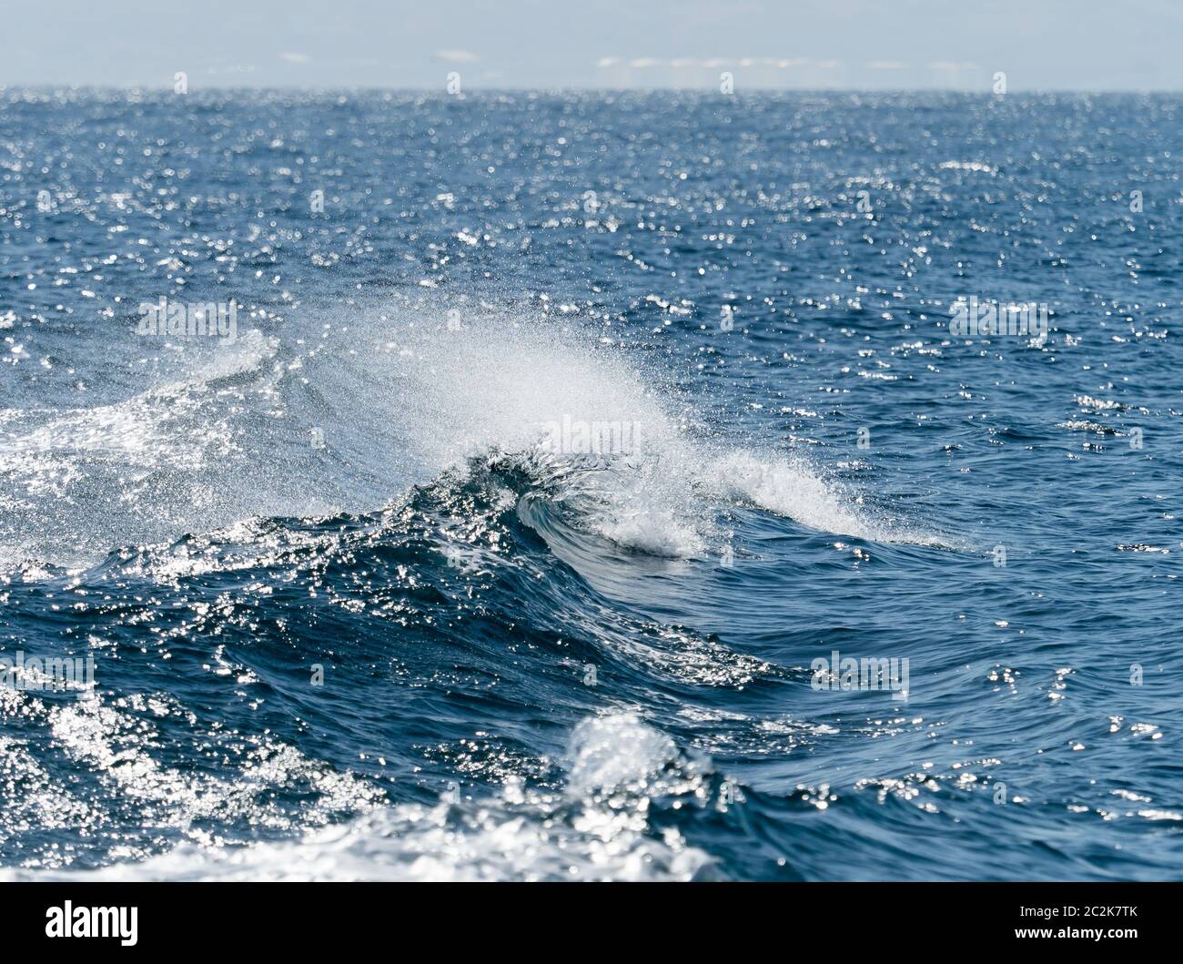 Waves in the wake of a boat in The Straits of Gibraltar. Stock Photo