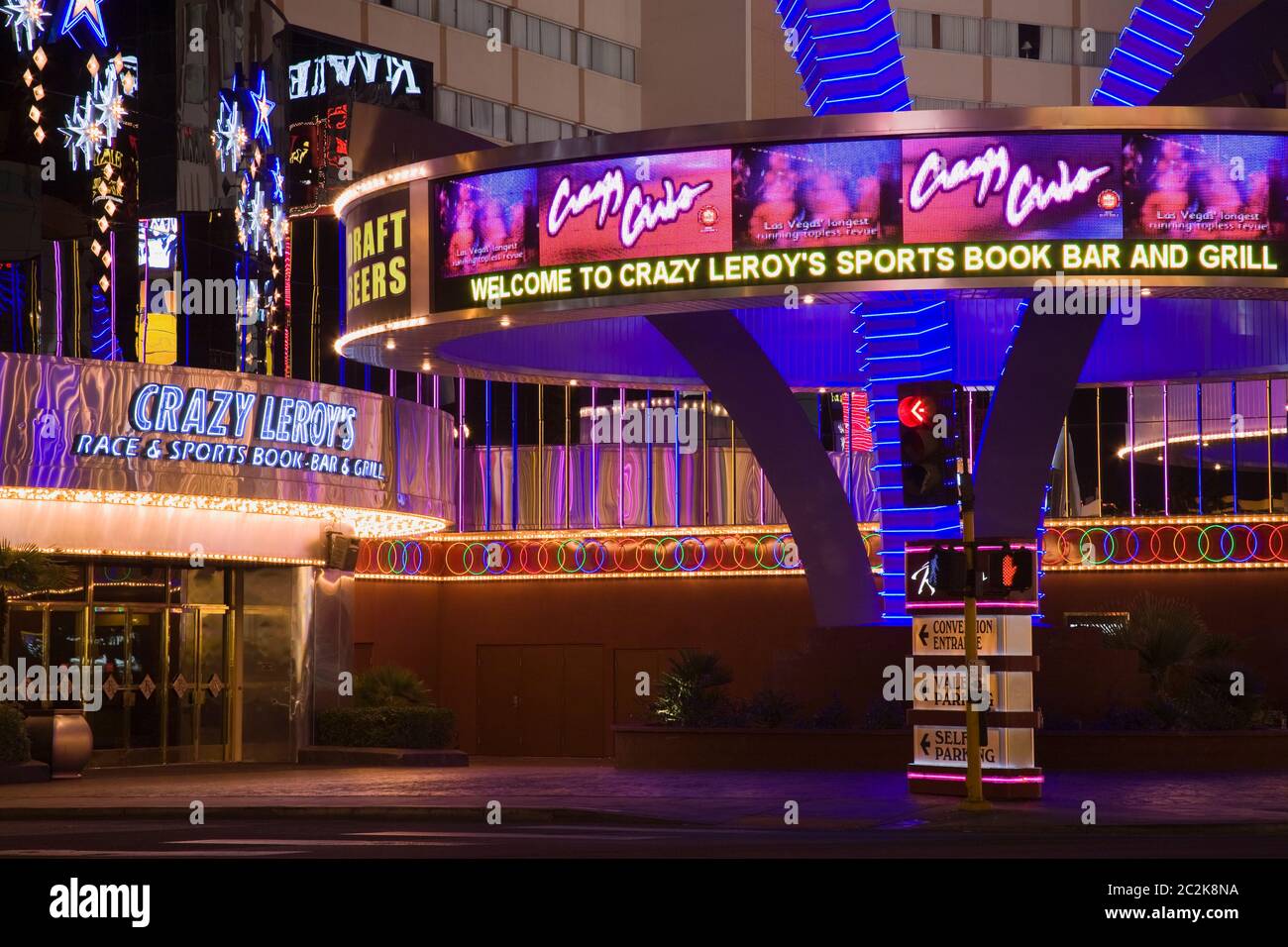 Brightly Colored Promotional Facade Of Riviera Hotel And Casino In