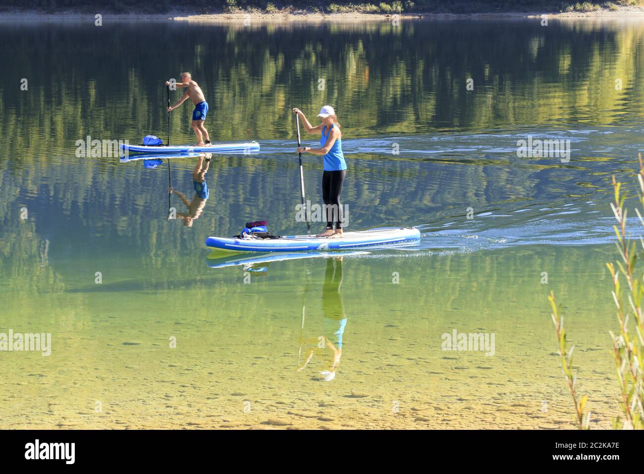 Stand UP Paddling trend sport, SUP Stock Photo