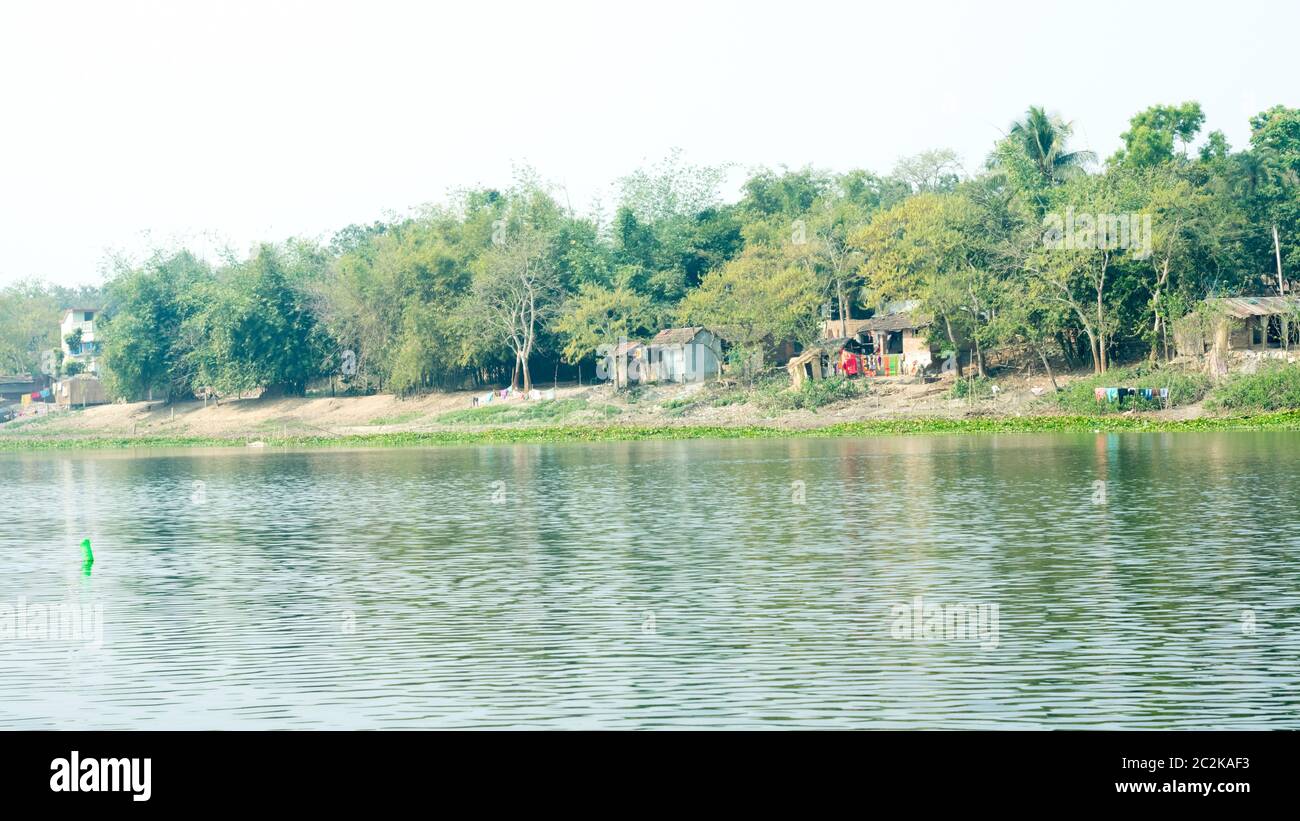 Ganges river shore (local name Damodar ) in sunset time with tropical