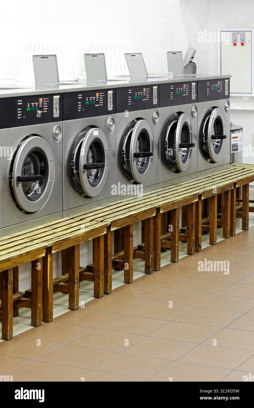 Coin Operated Washing Machines in Laundry Shop Stock Photo Alamy