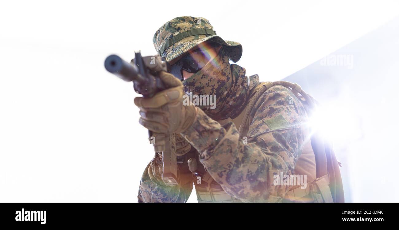soldier aiming white background Stock Photo - Alamy
