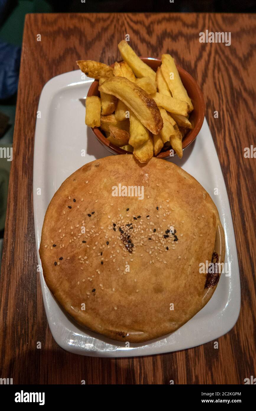 Elevated view of hamburger with french fries Stock Photo