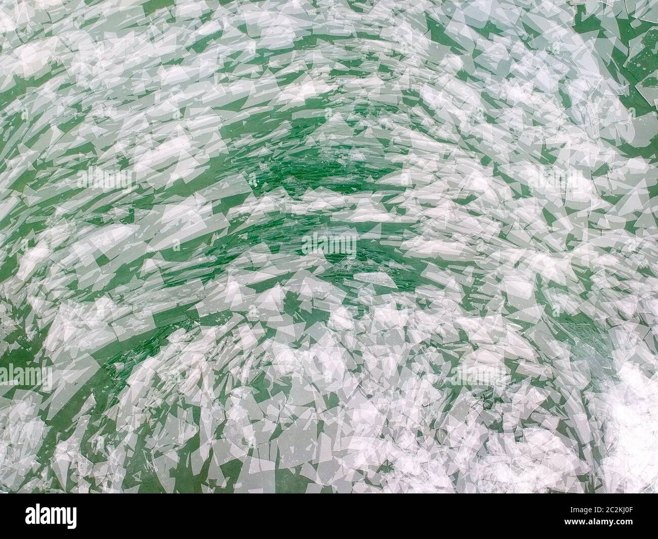 Aerial view of broken ice floating in water hi-res stock photography ...