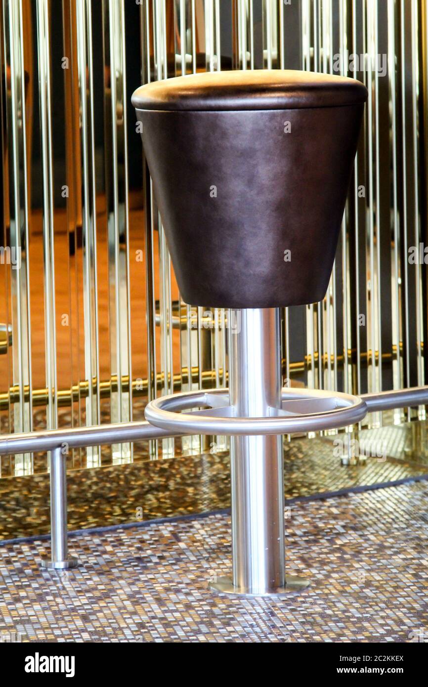 round metallic leathercovered bar stool Stock Photo Alamy