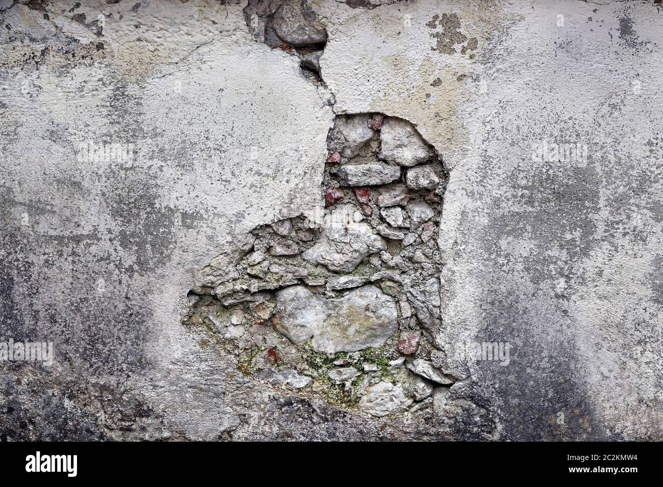 A dilapidated masonry. A broken wall on a building. Stock Photo