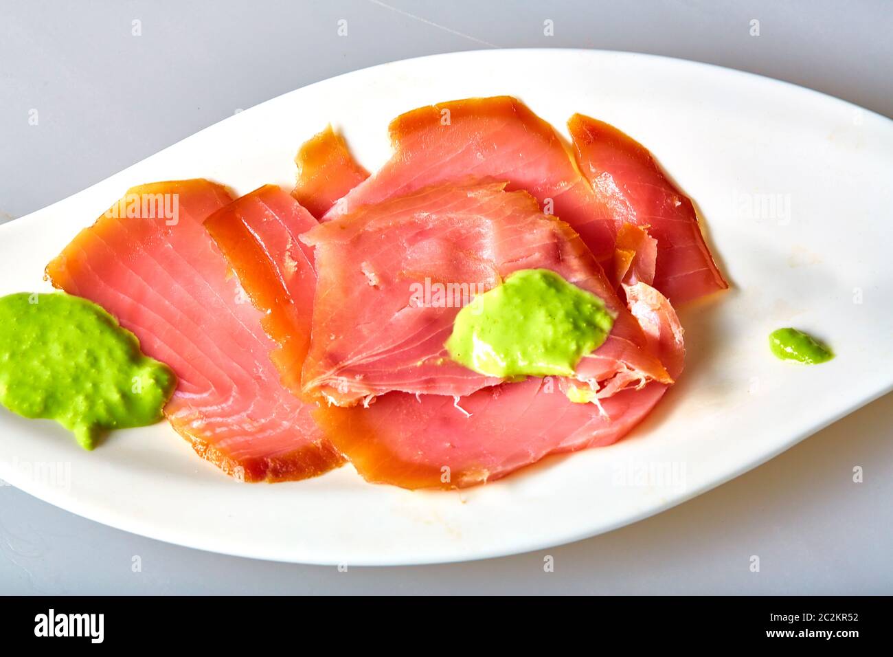 Smoked tuna with horseradish wasabi cream Stock Photo
