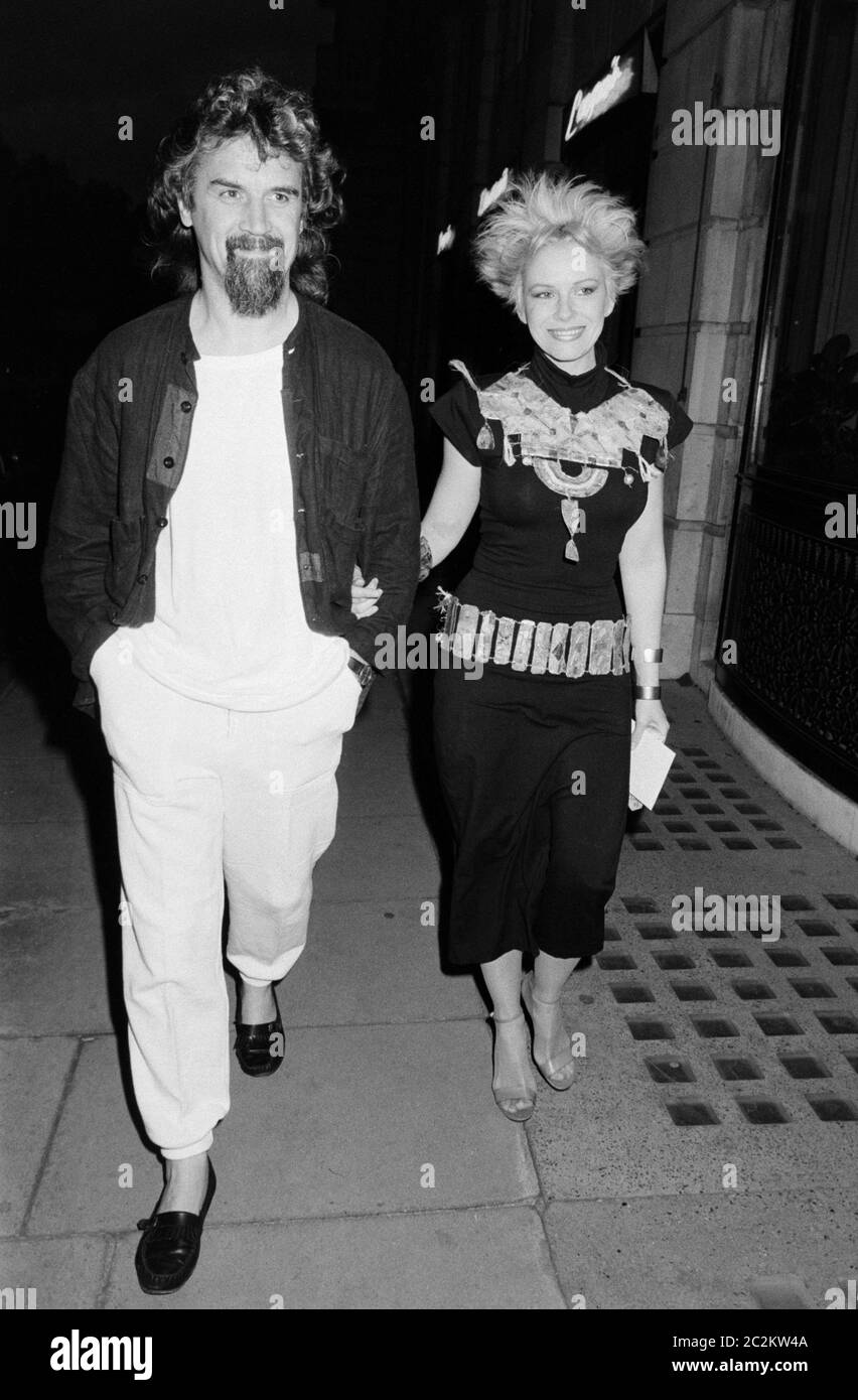 LONDON, UK. c. 1986: Actor/comedian Billy Connolly & wife Pamela Stephenson at party at Langan's Brasserie in London. © Paul Smith/Featureflash Stock Photo