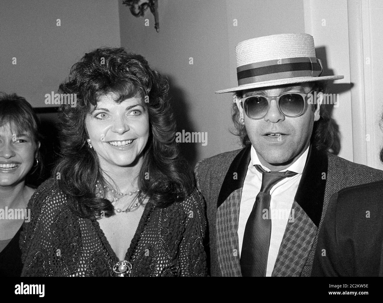 LONDON, UK. Sept 1985: Pop star Elton John & wife Renate Blauel in London. © Paul Smith/Featureflash Stock Photo