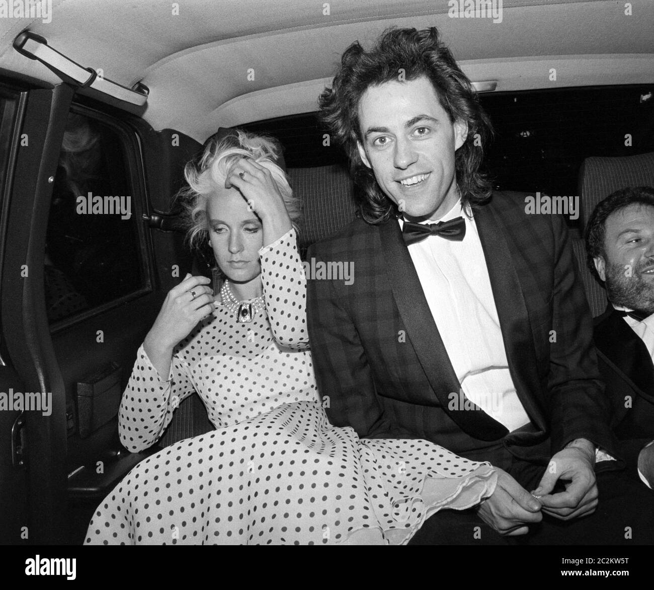LONDON, UK. c. 1986: Pop star Bob Geldof & wife Paula Yates at party at Langan's Brasserie in London. © Paul Smith/Featureflash Stock Photo