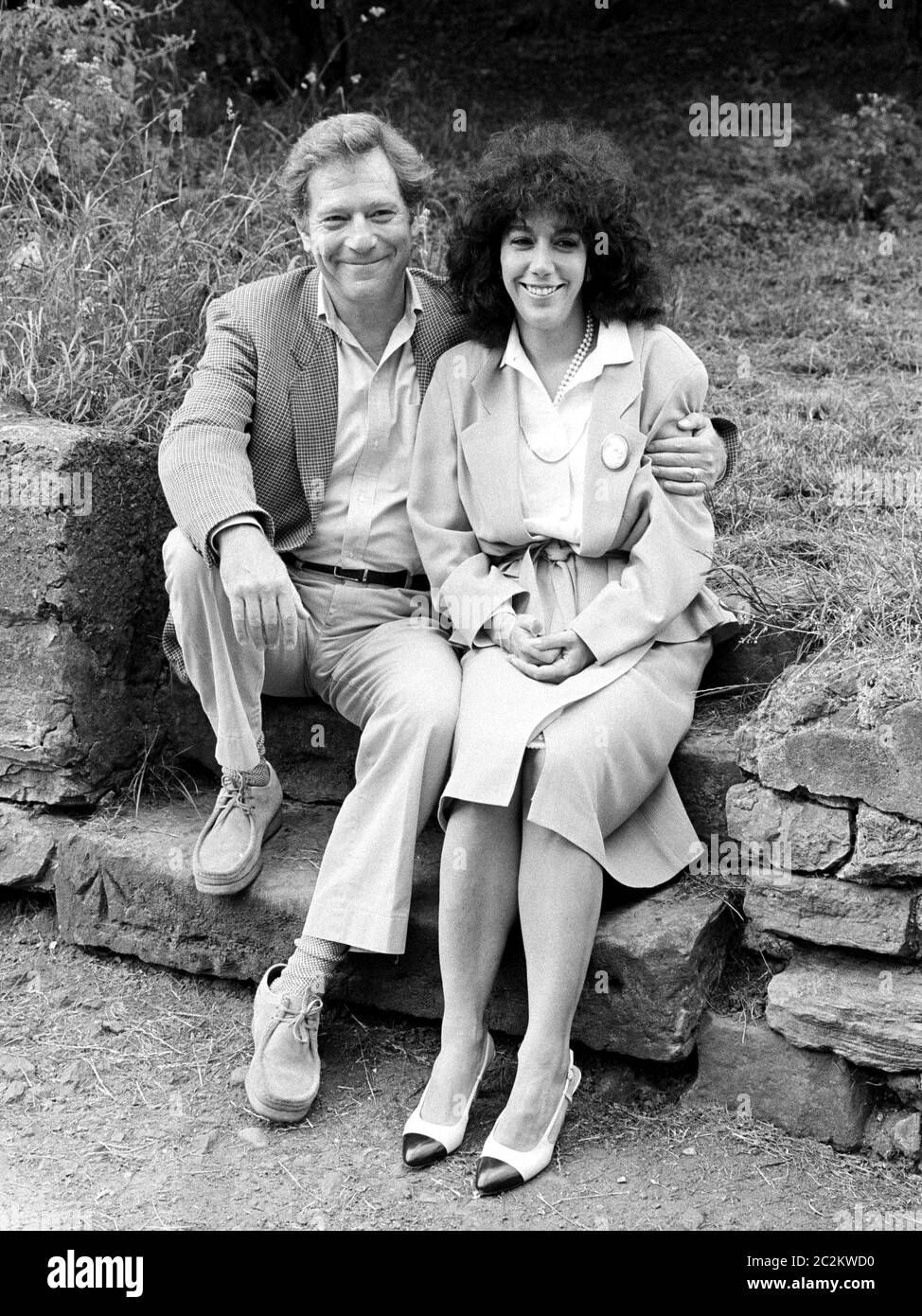 LONDON, UK.  July 1985: Actor George Segal & wife at a photocall in London. © Paul Smith/Featureflash Stock Photo