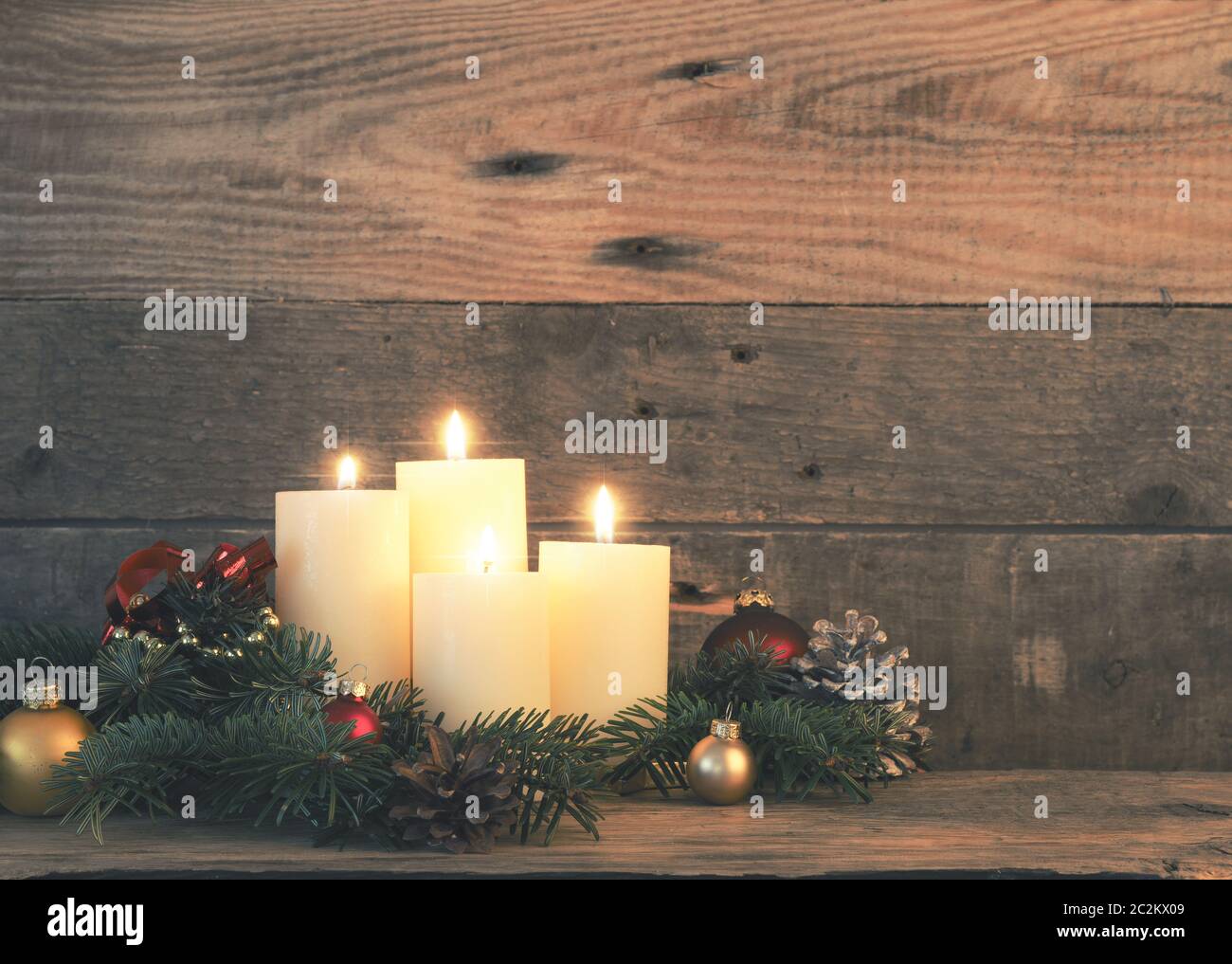 Fourth Advent Candle Christmas Background With Four Advent Candles On A Rustic Wooden Wall Stock Photo Alamy