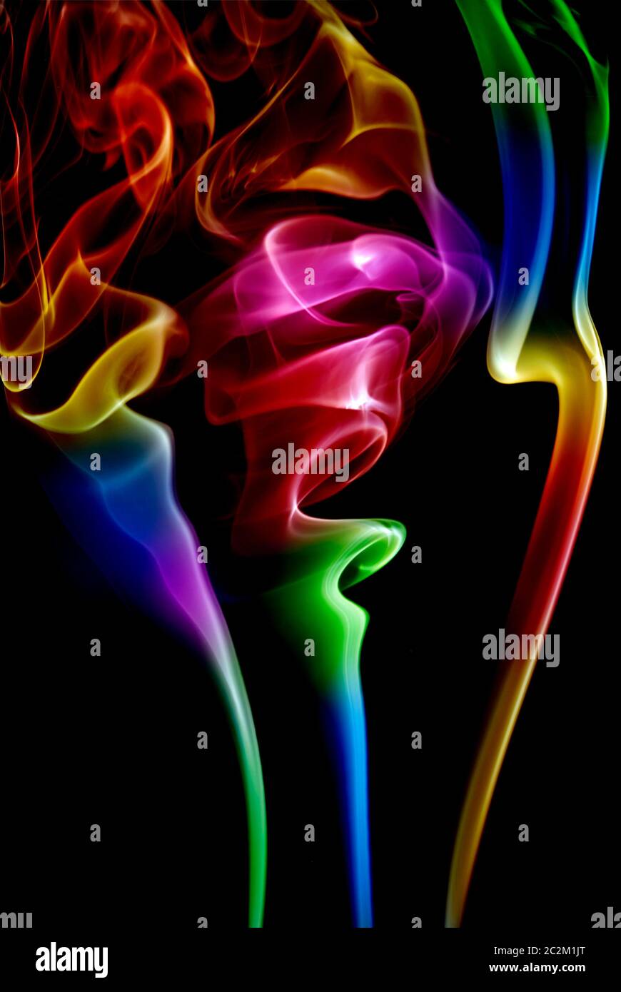 abstract colored smoke in a black background Stock Photo - Alamy